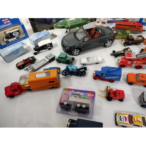 32 - Collection of Die-Cast Vehicles Featuring 1:18 Scale Models by Chrono and Maisto, Including 1997 Lot... 