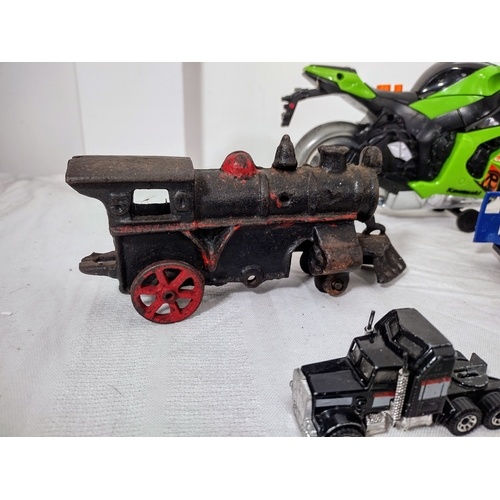 53 - Collection of Die-Cast and Vintage Toys Including a Cast Iron Train Locomotive Circa 1900s (possibly... 