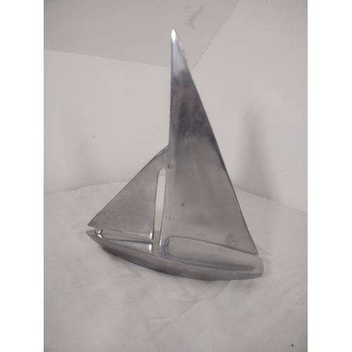 69 - Mid-20th Century Aluminium Sailboat Sculpture Featuring Minimalist Nautical Design.