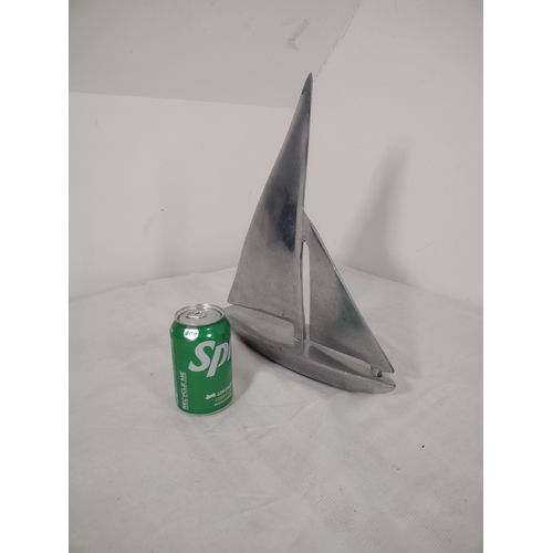 69 - Mid-20th Century Aluminium Sailboat Sculpture Featuring Minimalist Nautical Design.