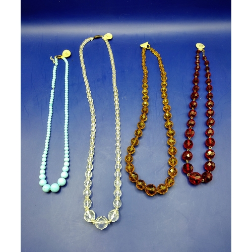 49 - Set of Four 1930s Glass Bead Necklaces Featuring Light Blue, Clear, Amber-Coloured, and Red Faceted ... 