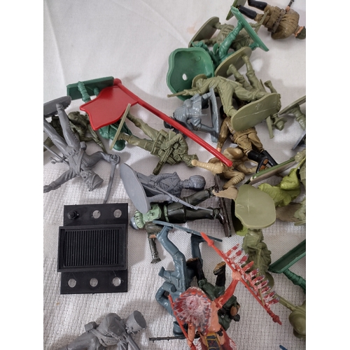 64 - Collection of Vintage Plastic Toy Soldiers and Accessories, Including Military, Cowboy, and Native A... 