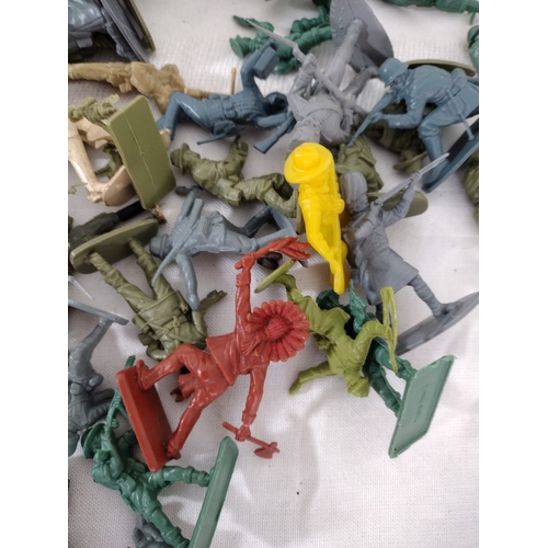 64 - Collection of Vintage Plastic Toy Soldiers and Accessories, Including Military, Cowboy, and Native A... 