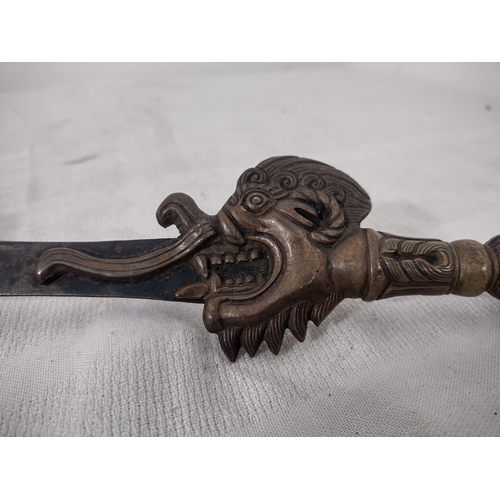 118 - Tibetan Bronze Ritual Phurba with Flaming Blade, Dragon Motif, and Vajra Handle, Early-20th Century ... 