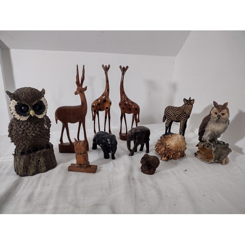 236 - Collection of Carved and Crafted Animal Figures Including Giraffes, Owls, Zebra, Elephants, and Othe... 