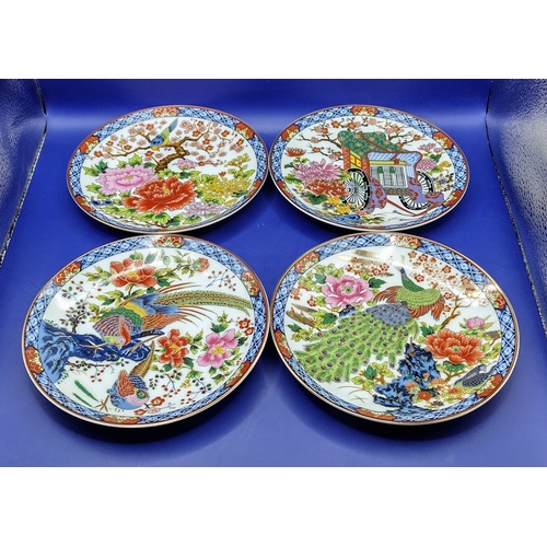 241 - Set of Four Mid-20th Century Japanese Hand-Painted Porcelain Plates by Eiwa, Featuring Peacocks, Flo... 