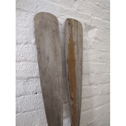 252 - Pair of Early to Mid-20th Century Wooden Rowing Oars with Plastic Collars, Approx. 140cm in length