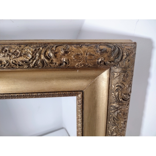 255 - Late 19th to Early 20th Century Ornate Gold-Brushed French Picture Frame Measuring 26 Inches by 23 I... 