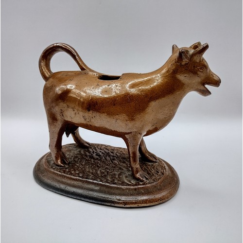 85 - Rockingham Style Victorian Ceramic Cow Creamer, Mid to Late 19th Century slightly a/f approx 15cm in... 