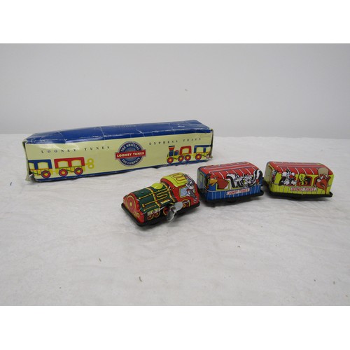 105 - Looney Tunes Wind Up Tin Plate Toy Train (boxed)