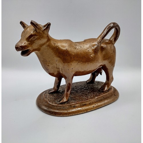 89 - Rockingham Style Victorian Ceramic Cow Creamer, Mid to Late 19th Century slightly a/f approx 15cm in... 