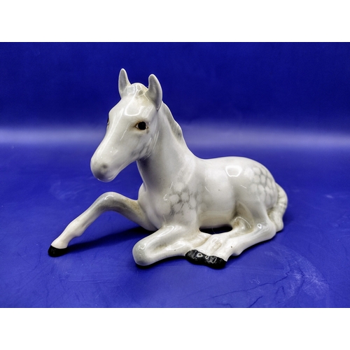 113 - Beswick Reclining Foal Model No. 915 in Dappled Grey with Early Indented Mark, Designed by Arthur Gr... 