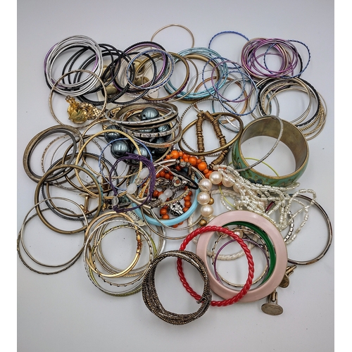 123 - Collection of Costume Bangles and Bracelets - various sizes and styles.