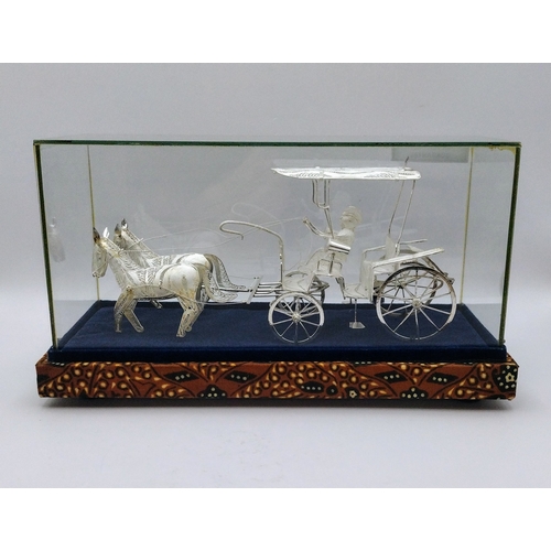 165 - Sterling Silver 925 Filigree Horse-Drawn Carriage in Glass Display Case with Batik-Patterned Base