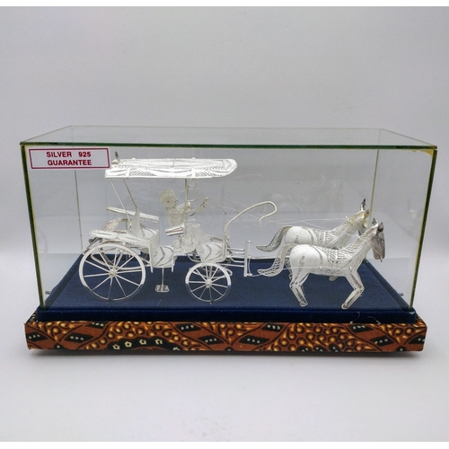 165 - Sterling Silver 925 Filigree Horse-Drawn Carriage in Glass Display Case with Batik-Patterned Base