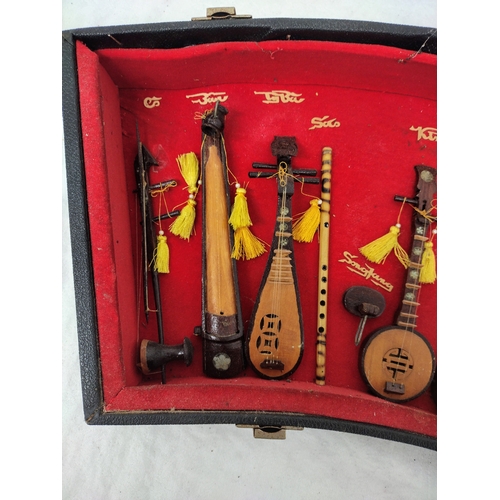 306 - Diorama of Miniature Vietnamese Traditional Musical Instruments in Curved Case, Mid to Late 20th Cen... 