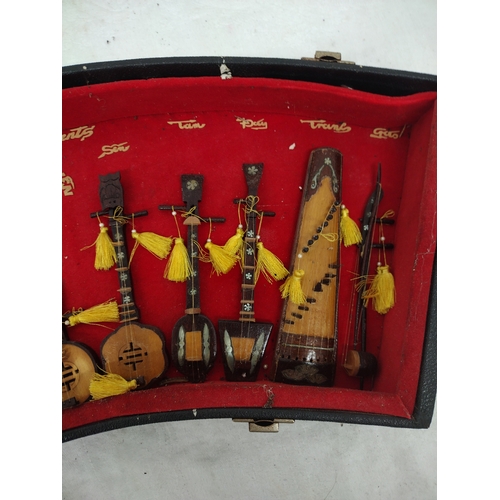 306 - Diorama of Miniature Vietnamese Traditional Musical Instruments in Curved Case, Mid to Late 20th Cen... 