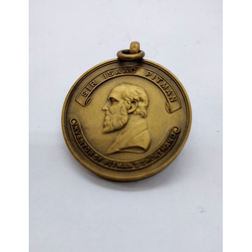 491 - 1920s Sir Isaac Pitman Bronze Medal Awarded For Attaining 120 Words Per Minute At Shorthand.