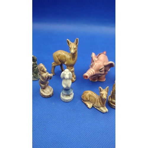 206 - A Collection of Wade Whimsies and Other Vintage Ceramic Animals