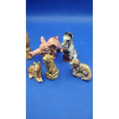 206 - A Collection of Wade Whimsies and Other Vintage Ceramic Animals