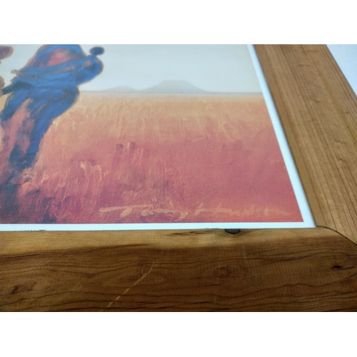 391 - Large Framed and Glazed Print by Tony Hudson, Featuring a Southern African Landscapes and Figure, La... 