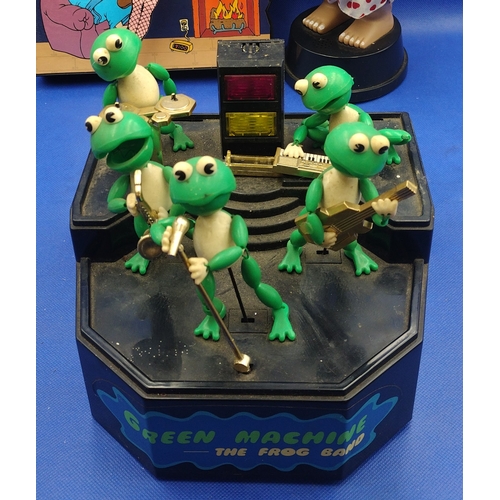 207 - Set of Three Vintage Novelty Items, Including Green Machine The Frog Band, Saucy Father Time Animate... 