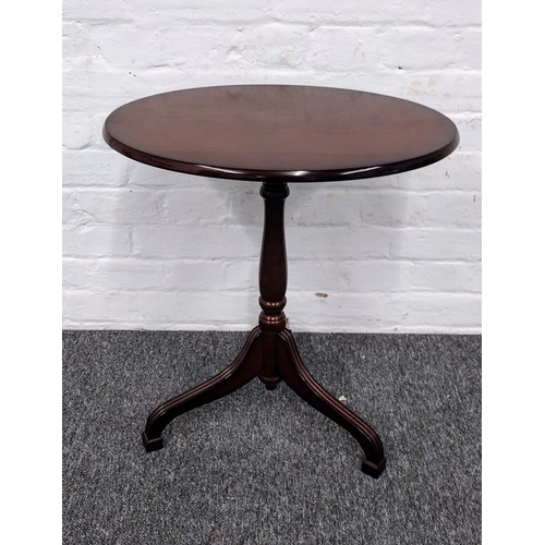 79 - Bombay Company Mahogany-Stained Tilt-Top Pedestal Table, 1993, with Tripod Base and Round Top Approx... 