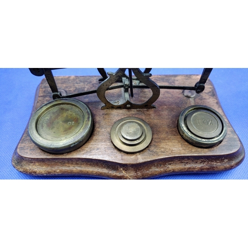 221 - Victorian Brass and Iron Postal Scales on Mahogany Base with Weights, Circa 1897–1900, Featuring Pos... 