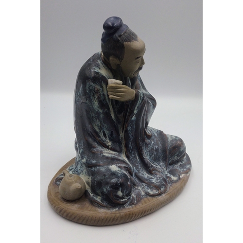 429 - Mid-20th Century Shiwan Mudman Figurine, Circa 1950s, Depicting a Seated Scholar Drinking Tea with T... 