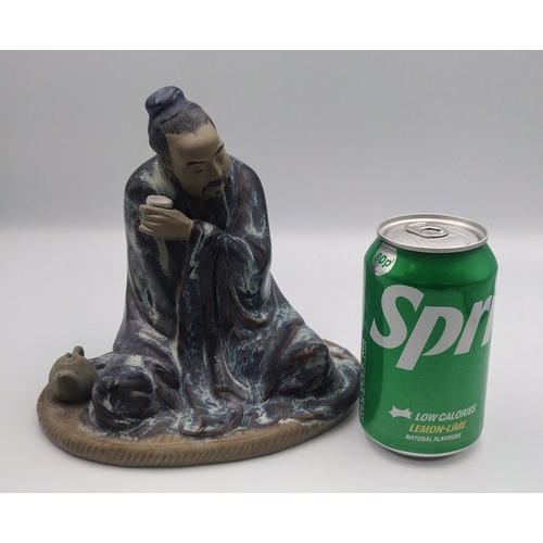 429 - Mid-20th Century Shiwan Mudman Figurine, Circa 1950s, Depicting a Seated Scholar Drinking Tea with T... 