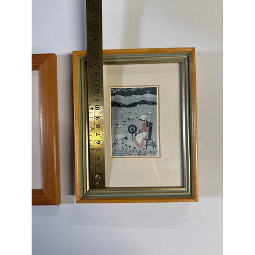 50 - A Pair of Framed Batik-Inspired Prints