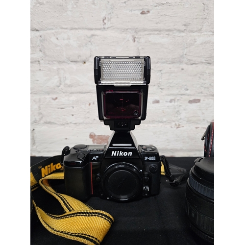 30 - Nikon F801 Camera with Two Sigma Lenses with Carry Case. Untested