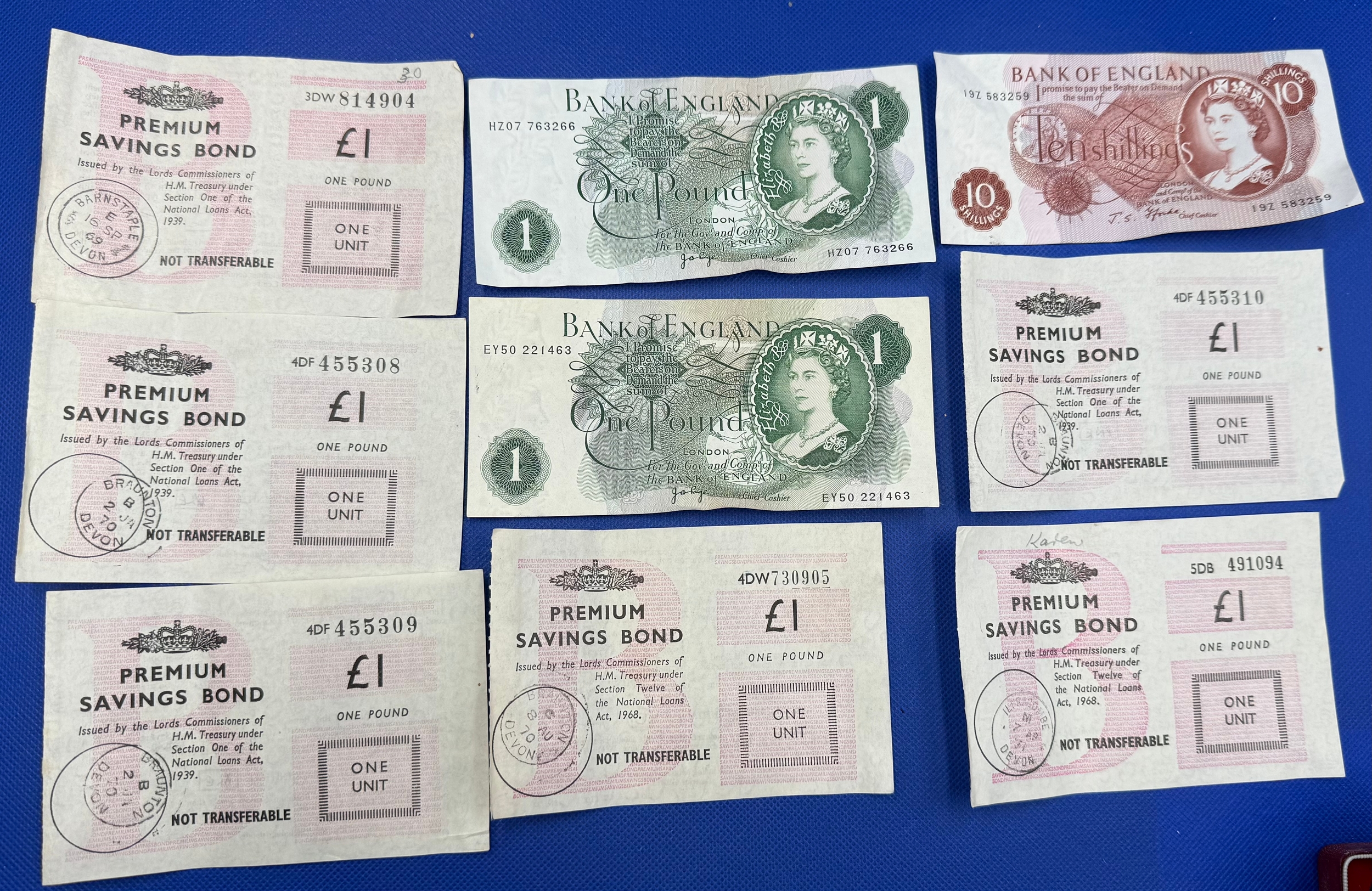 Two Old Paper £1 Notes , A 10 Shilling Note and Six £1 Premium Savings ...