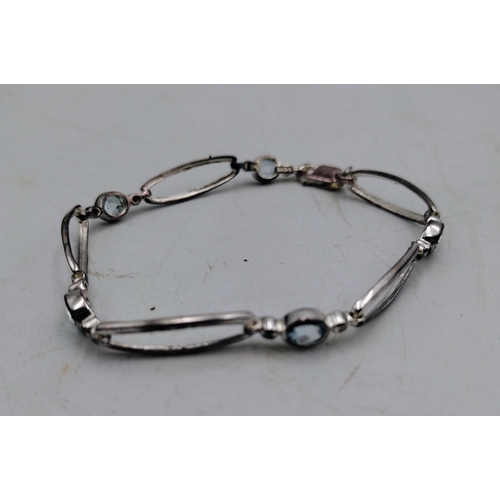 89 - Modern Sterling Silver Bracelet Set with Blue Topaz Stones, Approx. 6.77g