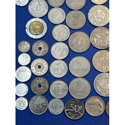75 - A collection of Silver and Silver Toned Coins Mostly European Ranging From 1907 to 1992