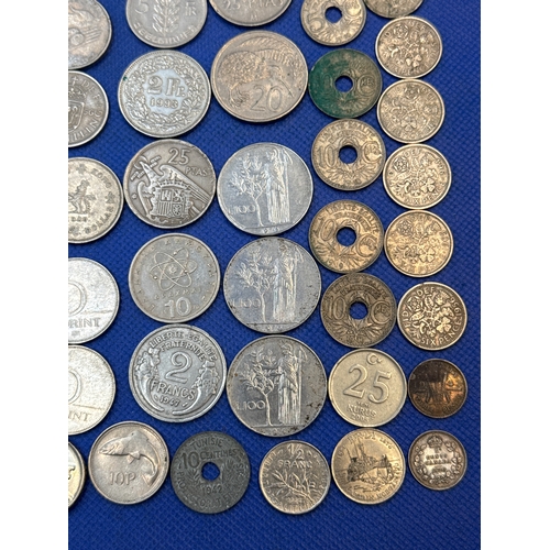 75 - A collection of Silver and Silver Toned Coins Mostly European Ranging From 1907 to 1992