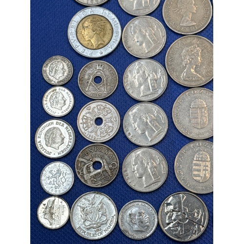 75 - A collection of Silver and Silver Toned Coins Mostly European Ranging From 1907 to 1992