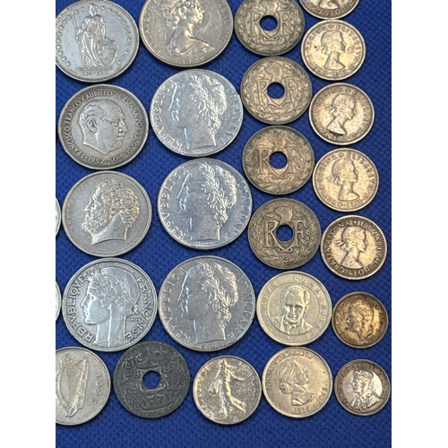 75 - A collection of Silver and Silver Toned Coins Mostly European Ranging From 1907 to 1992
