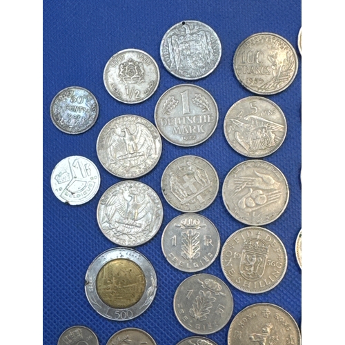 75 - A collection of Silver and Silver Toned Coins Mostly European Ranging From 1907 to 1992