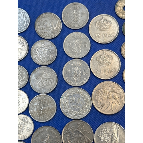 75 - A collection of Silver and Silver Toned Coins Mostly European Ranging From 1907 to 1992
