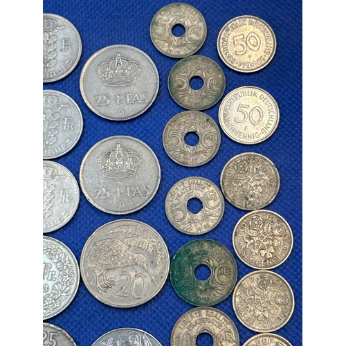 75 - A collection of Silver and Silver Toned Coins Mostly European Ranging From 1907 to 1992