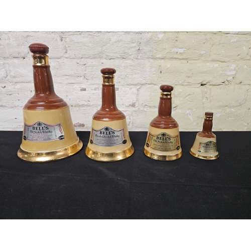 Set Of Four Wade Bell’s Scotch Whisky Wade Ceramic Bell Decanters In Graduated Sizes