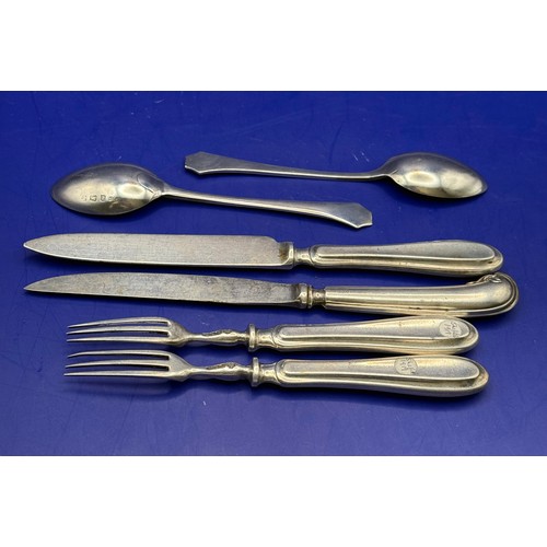 20 - Two Sterling silver Forks , Two Silver Spoons , One Silver Knife and One Silver Handled Steel Blade ... 
