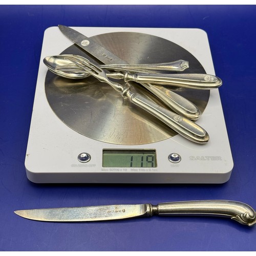 20 - Two Sterling silver Forks , Two Silver Spoons , One Silver Knife and One Silver Handled Steel Blade ... 