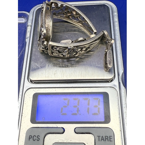 62 - A Ladies' Sterling Silver and Marcasite-Set Quartz Bracelet Watch