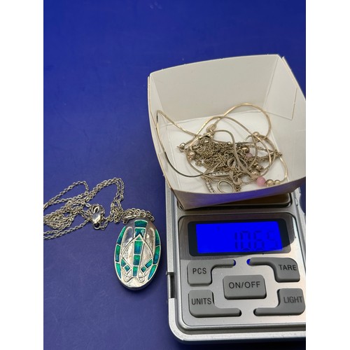 23 - Four Sterling Silver Chains with Pendants est 12g 925