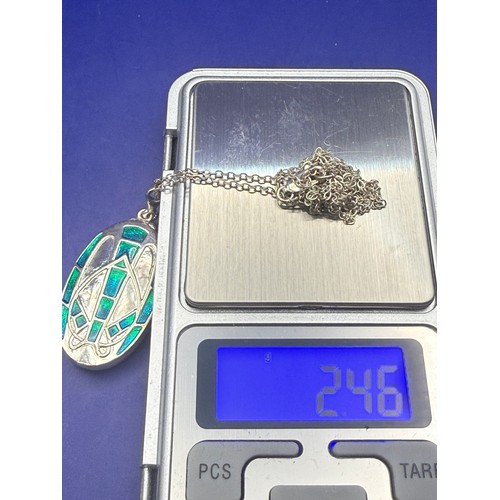 23 - Four Sterling Silver Chains with Pendants est 12g 925