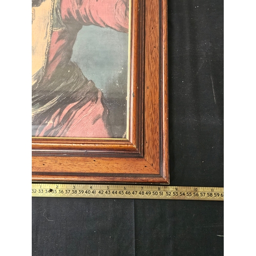Study of a Vintage Clown Juggling Balls Presented In A Dark Vintage Frame.