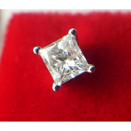 23 - A PAIR OF 14CT WHITE GOLD AND PRINCESS CUT DIAMOND STUDS
Screw backs. 
(approx diamond 1.00ct)