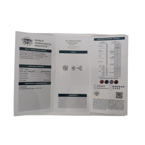 10 - A PAIR OF 18CT WHITE GOLD AND ROUND BRILLIANT CUT DIAMOND STUDS
Four claw setting, complete with WGI... 